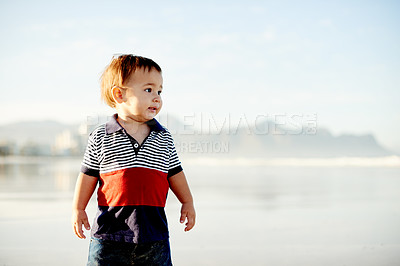 Buy stock photo Boy, toddler and view at beach with childhood, holiday and space outdoor for travel. Adventure, nature and mockup for summer fun with male kid by ocean, games or playing with vacation in Spain
