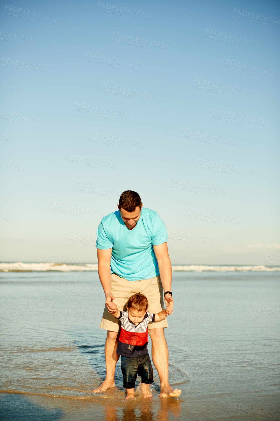 Buy stock photo Dad, beach and playing with child in water for holiday, weekend getaway or childhoood in nature. Father, son or holding hands with kid on ocean coast or mockup space for outdoor bonding together