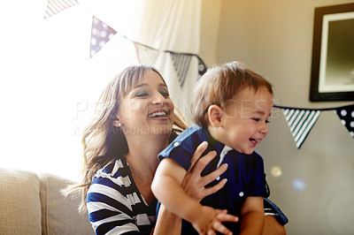 Buy stock photo Birthday party, mother and boy with smile, home and celebration with happiness, energy and family. Apartment, parent and mama with son, event and love with care, bonding together and laughing
