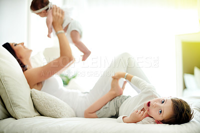 Buy stock photo Baby girl, mom and portrait of boy on bed in home together for bonding, family time or relationship. Love, maternity or security with son, daughter and woman in bedroom of apartment for wellness