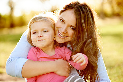 Buy stock photo Portrait, mother and daughter in nature with hug, support and bonding together for childhood development. Happy, parent and girl child playing outdoor on weekend for love, growth or family connection