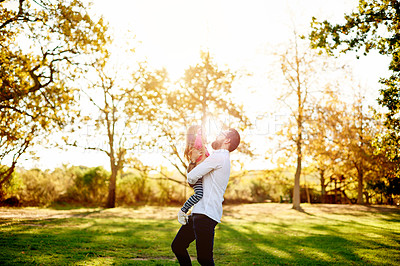 Buy stock photo Flare, daughter and father playing in park for bonding, outdoor space and family time for happiness. Love, relationship and man with child outside together, care and support for summer sunshine.