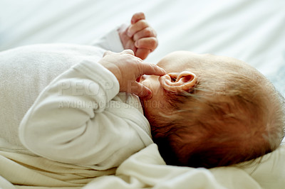 Buy stock photo Infant, baby and sleeping on bed for growth, calm and peaceful nap with healthy kid in home. Child, asleep in nursery for early childhood development, rest or relax with newborn dreaming in house