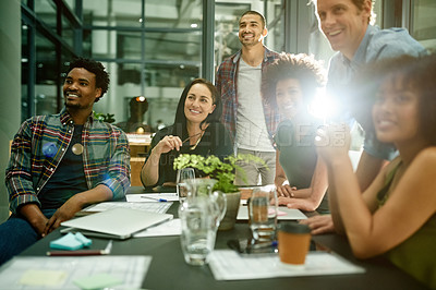Buy stock photo Discussion, collaboration or team in office for meeting, creative planning or presentation idea at night. Communication, flare or employees at marketing agency, strategy or brainstorming for deadline