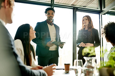 Buy stock photo Presentation, speakers and business people in meeting on tablet for finance review, feedback and strategy. Office, corporate and worker on tech for financial report, discussion and online proposal