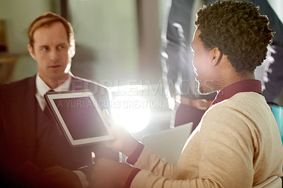 Buy stock photo Man, lawyer and tablet with team, meeting and discussion for review, blank screen and insight at office. People, attorney and talk for planning, feedback or app with lens flare at corporate law firm
