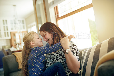Buy stock photo Happy, mother and hug with child on sofa for love, affection and bonding together for weekend break. Smile, woman and embrace with kid for safety, trust and support for family time  on couch at house