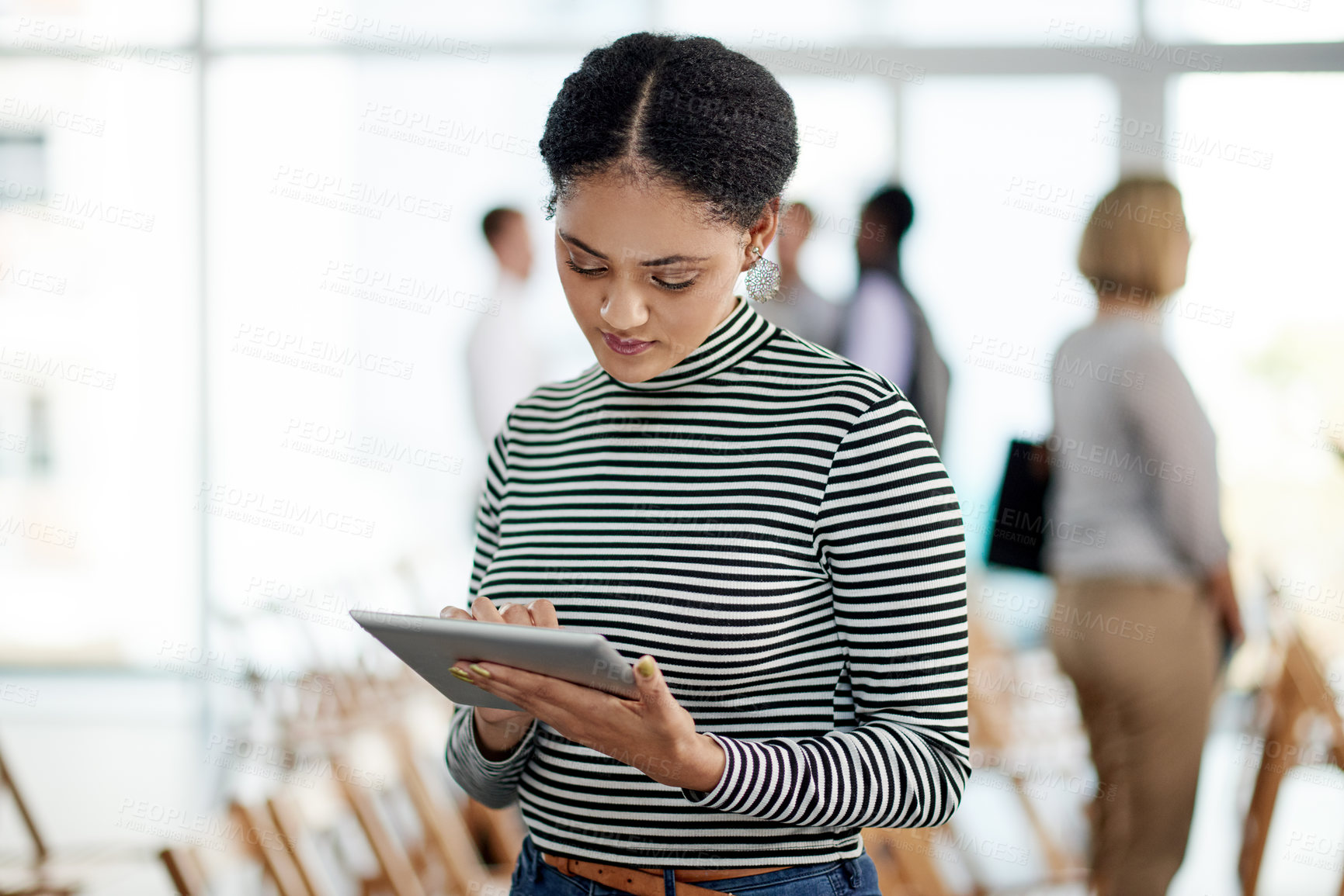 Buy stock photo Creative, woman and typing with tablet in office for research, editor feedback and proofreading. Journalist, digital and review for fact check, editing article and update draft for publication agency