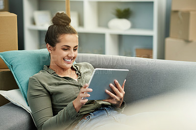 Buy stock photo Relax, moving and woman with tablet, home or research for renovation of apartment, flare or website. Relocation, boxes and person with tech for house improvement, browsing or info for interior design