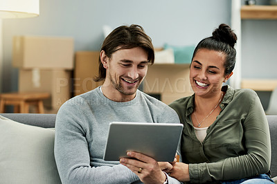 Buy stock photo Happy, relax and couple on sofa on tablet for watching movies, funny series and entertainment. Bonding, videos and man with woman on digital tech for subscription, film and comedy on weekend in home