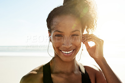 Buy stock photo Earphones, fitness and portrait of woman on beach for start of cardio training or workout in summer. Exercise, flare and smile of African athlete or runner streaming music outdoor for health session