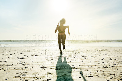 Buy stock photo Woman, portrait and running with fitness on beach for workout, exercise or outdoor training. Active, female person or runner with sunshine for sprint, cardio practice or health and wellness on space