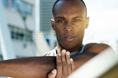 Buy stock photo Fitness, black man and stretching portrait in city to start workout, exercise and cardio warm up. Serious runner, athlete and training outdoor for marathon preparation, sports performance and health