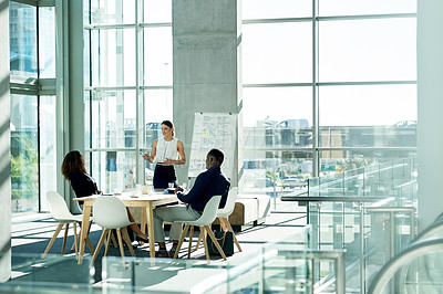 Buy stock photo Presentation, meeting and training with business people in office for discussion, planning or project management. Collaboration, teamwork and woman with whiteboard for brainstorming, report or review