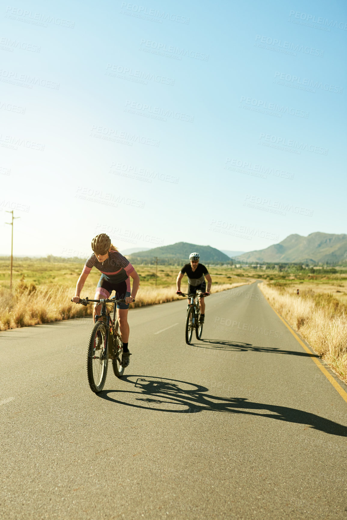 Buy stock photo Cycling, health and travel with couple in nature for adventure, race team and cardio workout. Exercise, training and bike with man and woman in countryside for athlete, sports and bicycle space
