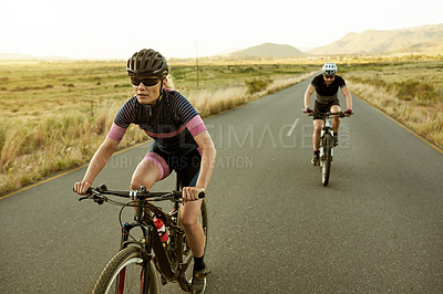 Buy stock photo Fitness, people and cycling on bike in road for pace training, race performance or challenge. Sport, cyclist and team riding on bicycle in countryside for cardio exercise, endurance workout or safety