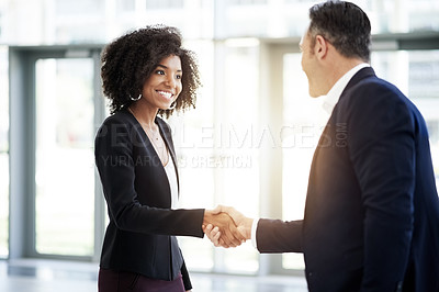 Buy stock photo Corporate, meeting and business people with handshake in office for introduction, collaboration and networking. Happy, lobby and man and woman shaking hands for agreement, b2b partnership and welcome