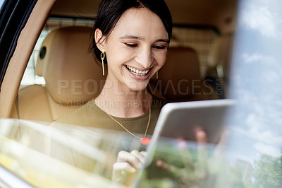 Buy stock photo Woman, taxi and tablet with smile for travel, urban commute and communication on drive. Transport, car window and cab ride with business person, technology and schedule or agenda on road to work