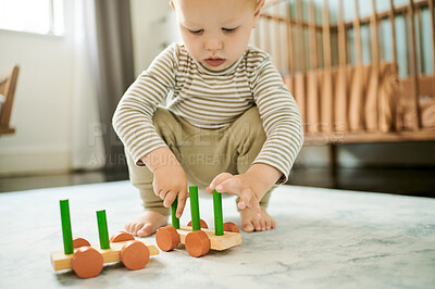 Buy stock photo Baby, child and playing with building blocks in home bedroom for fun and growth development. Male toddler or kid with car toys for learning, education or game for creativity and fine motor skills