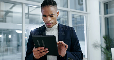 Buy stock photo Businessman, reading and scroll in office with tablet, check email and daily admin for finance job. African person, browsing and tech in workplace for online schedule, financial report and review