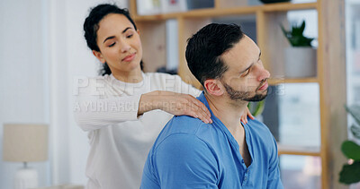Buy stock photo Love, couple and massage shoulders in home for support, wellness and relax for tension relief. Man, woman and body care with peace, calm and gentle touch for health with stress free partner at house
