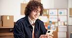 Logistics, small business and man with phone, message and delivery update on social media and chat. Texting, online and happy person with mobile, supply chain or communication with contact in startup