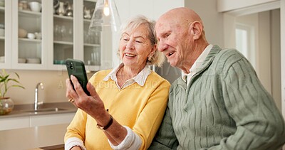 Buy stock photo Senior, couple and video call in home with phone, internet connectivity or online meeting on weekend. Happy, married elderly people and relax in house with tech, virtual contact and bonding together.