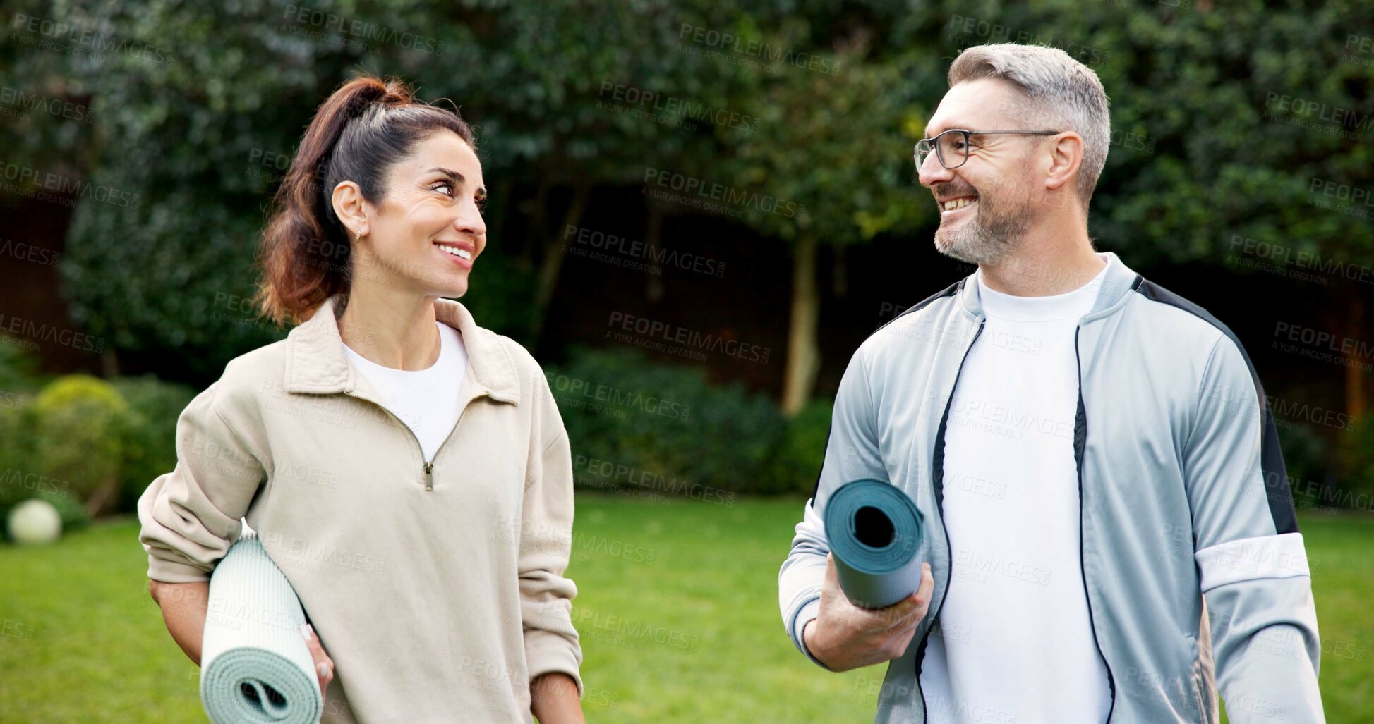 Buy stock photo Happy, couple and workout in backyard with yoga mat, fitness and active together for holistic health. Mature people, relationship and smile outdoor with exercise equipment, wellness and vitality.