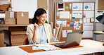 Laptop, logistics or happy woman with fist pump in office for small business success or good news. Excited, female person or smile with computer for winning, online achievement or celebration in shop