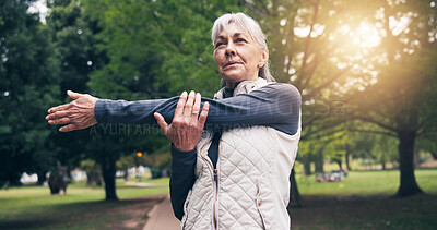 Buy stock photo Serious, old woman and stretching at park for yoga, exercise and training for healthy lifestyle. Thinking, senior person and warm up in nature for pilates, fitness and outdoor workout for wellness