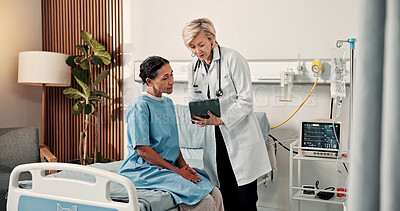 Buy stock photo Doctor, woman and talk on hospital bed with tablet, advice or explain test results for breast cancer. Medical worker, mature people and discussion in clinic with tech, oncology specialist and help.