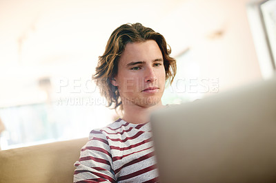 Buy stock photo Laptop, thinking and man on sofa for email, reading and university scholarship application in home. Tech, research and male student in living room for college admission test, exam or study assignment