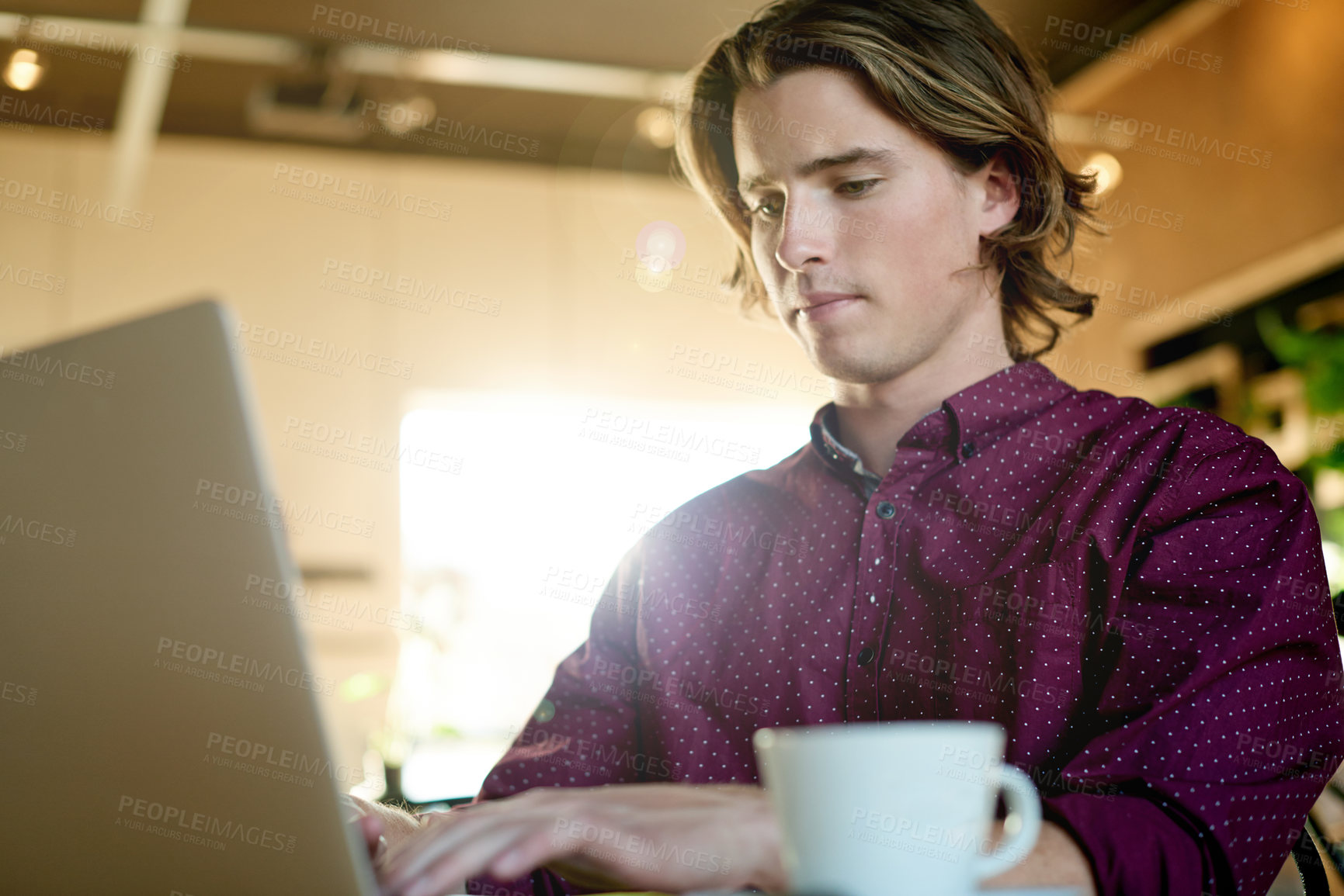 Buy stock photo Laptop, student and man in coffee shop for online education, research or check curriculum. Computer, cafe and remote learning with scholarship, typing thesis and quiz for college course on internet