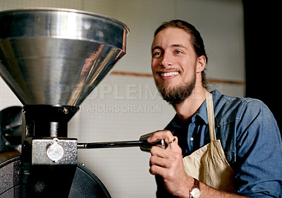 Buy stock photo Equipment, ground coffee and smile of barista man in workshop for production of caffeine beverage. Machinery, roasting and thinking with happy person in kitchen of cafe or restaurant for service