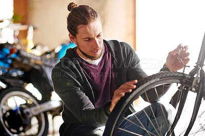 Buy stock photo Man, bike and repair brakes at workshop with cable inspection, maintenance and services at garage. Person, bicycle and safety check with wheel, tyres and gear with restoration job at small business