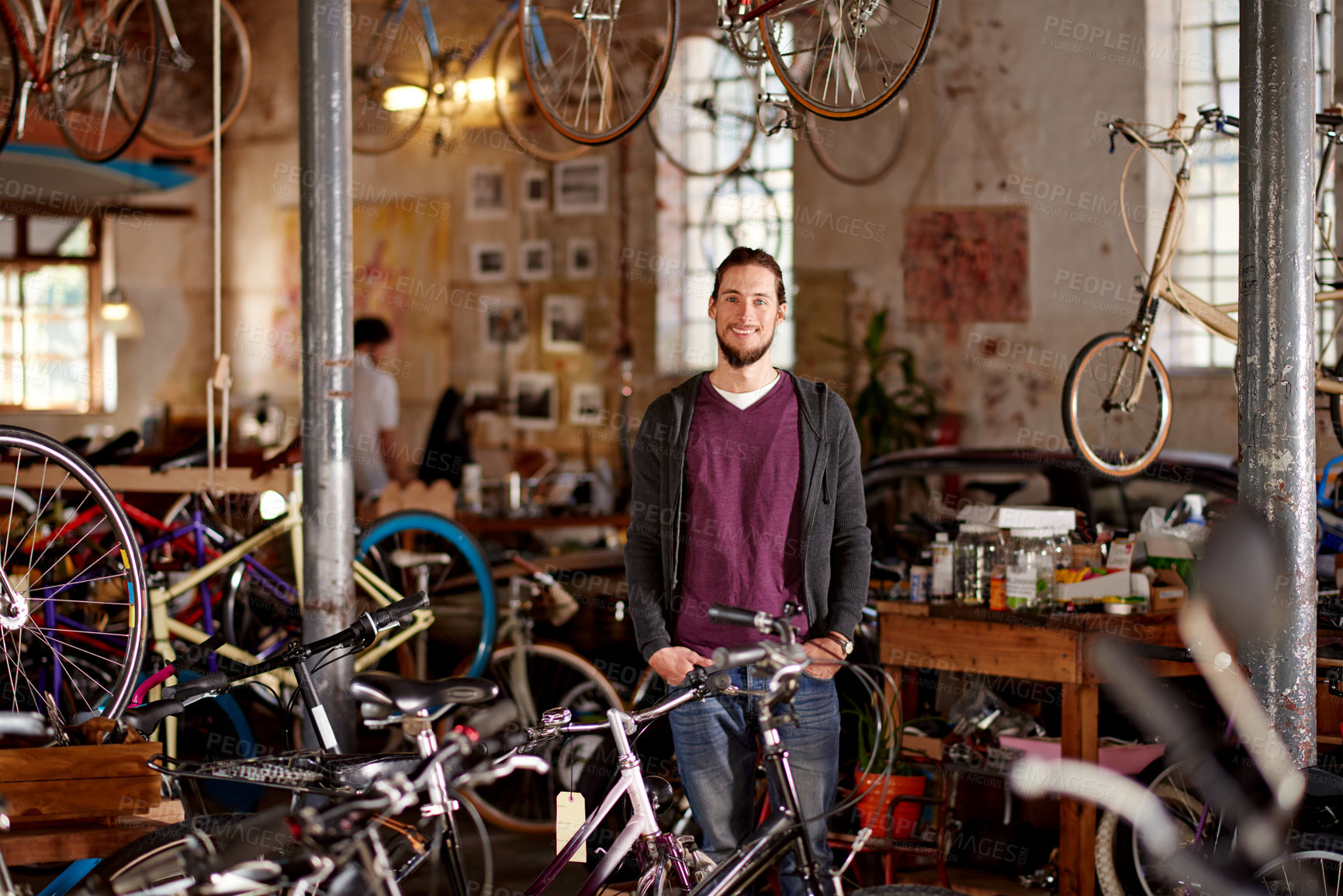 Buy stock photo Bicycle, business and portrait of man in workshop for fixing, repair and selling bike equipment. Startup, store and person with sustainable vehicle for maintenance, cyclist technician and mechanic