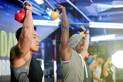 Buy stock photo Fitness class, man and kettlebell workout at gym for core strength, cardio or muscle development. Night, bodybuilder or weightlifting with group for endurance challenge, functional exercise or health