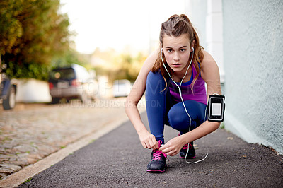 Buy stock photo Portrait, shoelace and teenage girl with fitness, runner and prepare for training, workout and sportswear. Face, healthy person and athlete in street, sneakers and start with morning and challenge
