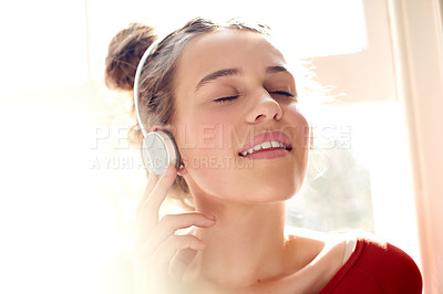 Buy stock photo Girl, headphones and relax with music in home for meditation, inspiration and calm podcast. Flare, face of person and listening to streaming subscription for mental health, mindfulness or audio track