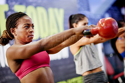Buy stock photo Gym, workout or person in fitness class with kettlebell for strength training, cardio or wellness. Exercise, active or woman in health club with equipment for wellbeing, healthy body or weightlifting