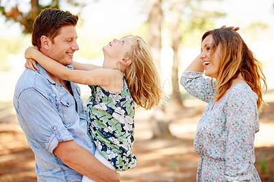 Buy stock photo Happy, nature and parents with kid in park for bonding, care and family time on holiday. Smile, love and girl child with mom and dad for playing together outdoor in garden on weekend in countryside.