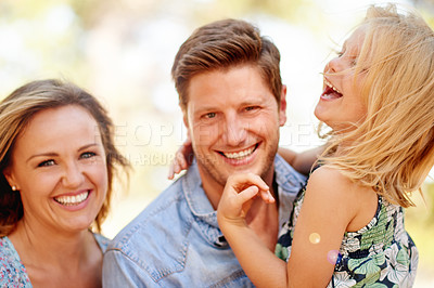 Buy stock photo Outdoor, happy family and fun in park with smile, relax and bonding in summer for wellness. Adventure, mother or father in garden with child, travel or vacation on holiday trip for childhood memory