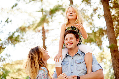 Buy stock photo Happy child, mother and father at forest with piggyback ride, outdoor and sunlight in summer. Smile, connection and family in nature with trust, bonding together and positive memory in park.