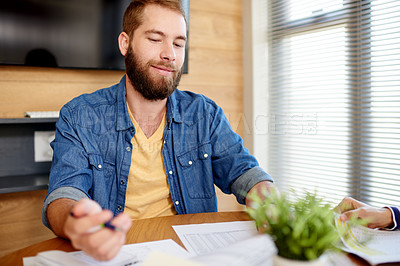 Buy stock photo Business, meeting and man in office, planning and documents for sales revenue. People, employee and advertising agent in workplace, thinking and report for profit growth and company expenditure