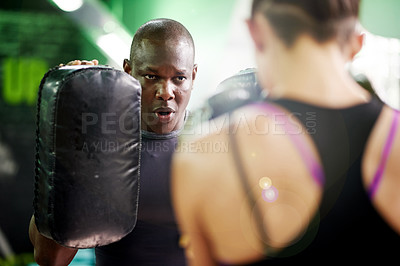 Buy stock photo Boxing, pads and workout with personal trainer man in gym for fitness or sparring session. Exercise, sports or training with boxer and coach in health club for improvement of skill or technique
