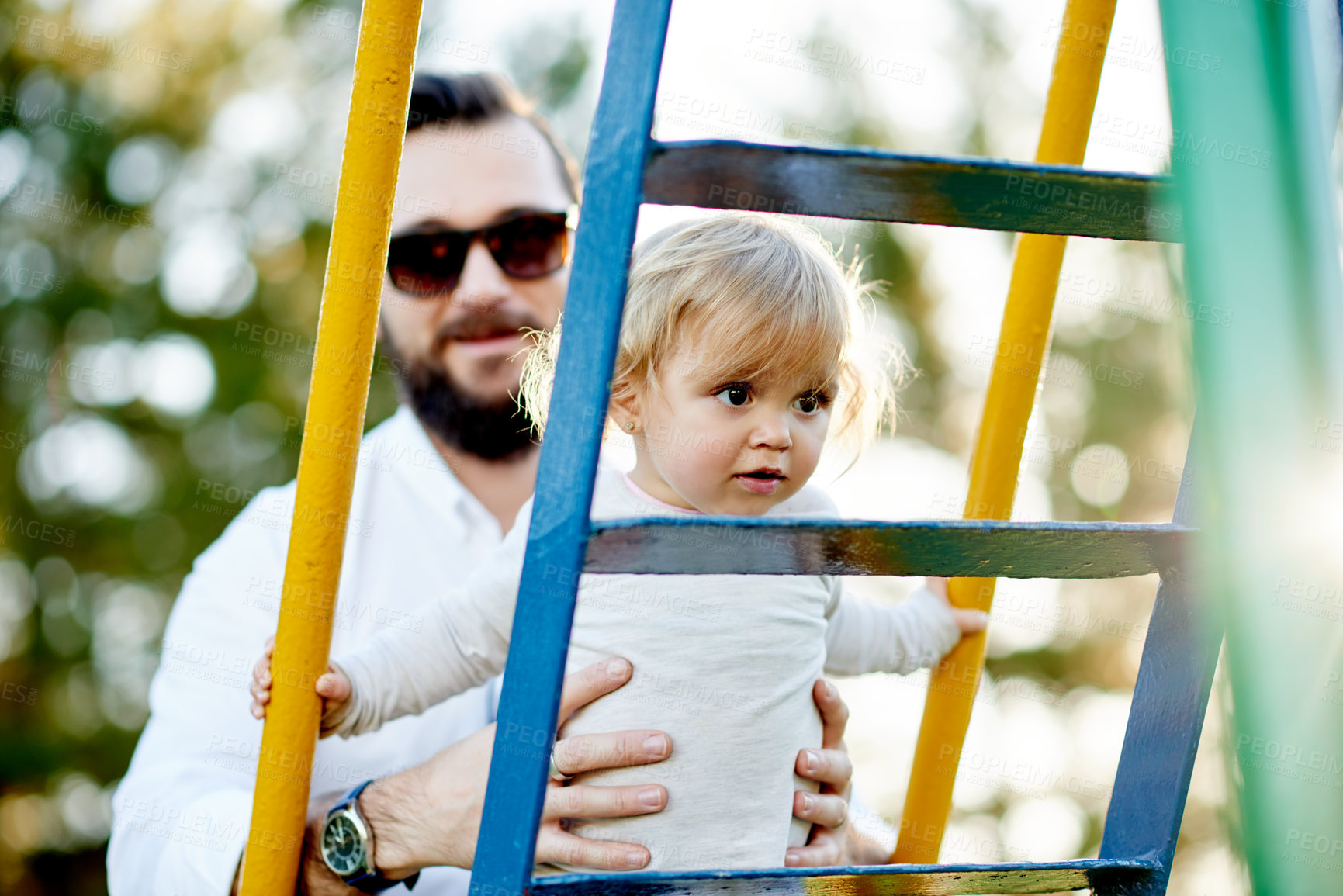Buy stock photo Nature, jungle gym and dad with child in park for holiday, weekend or vacation together. Smile, trees and girl kid with father for playing outdoor on playground for connection or bonding in summer.