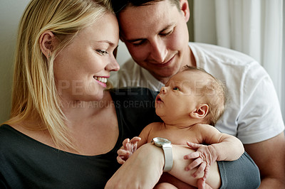 Buy stock photo Relax, love and parents with baby in home for bonding, care and family time in living room together. Happy, people and newborn with mom and dad in lounge for support, safety and childcare in house.