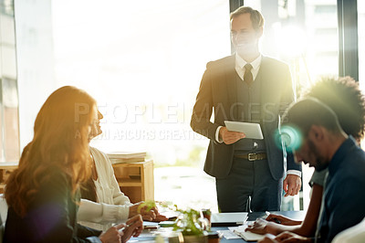 Buy stock photo Office, speaker and man with tablet, meeting and new ideas for funding opportunity or communication. Boardroom, people and account manager with tech for investment strategy, flare and business growth