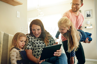 Buy stock photo Tablet, smile and mother with child on sofa for education app, streaming service and research. Home school portal, ebook subscription and woman with kid in living room of family house for tech