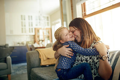 Buy stock photo Mother, child and hug in home for love, support and connection with girl. Sofa, mom and embrace kid for care, safety or happy parent bonding with daughter for trust with family together in lounge
